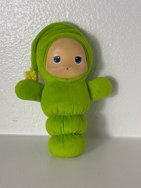 Cute 2009 Playskool / Hasbro Gloworm plush doll in bright green.